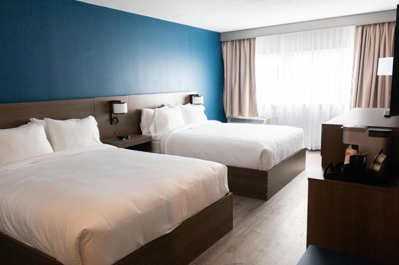 Comfort Suites Kingston Central Bagian luar foto